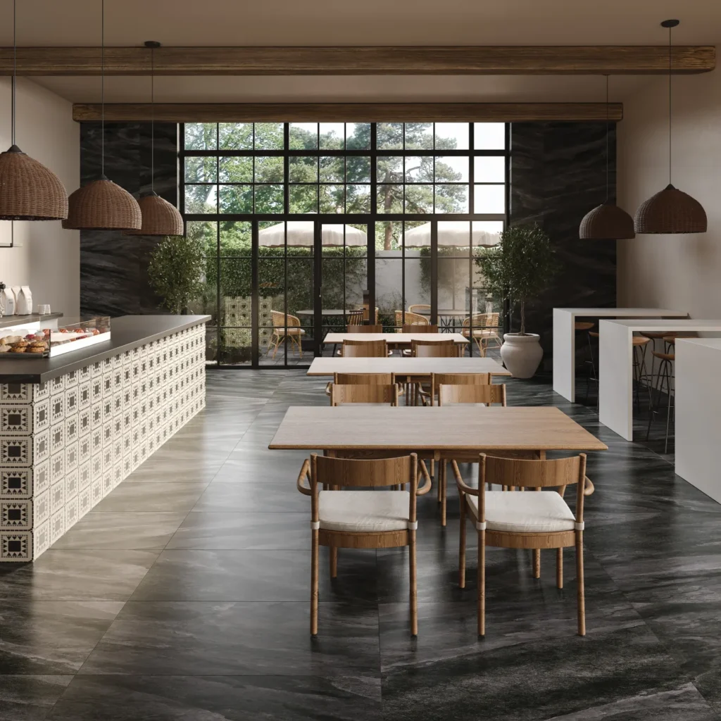 Magnifica 24 x 48 - 8mm Honed Porcelain in Pietra Scura sample cafe setting